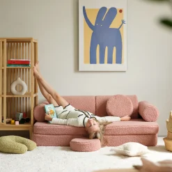 Canapé dépliable en sherpa bouclé rose 136x78x40cm Settle - Wigiwama