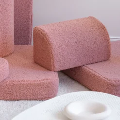 Canapé dépliable en sherpa bouclé rose 136x78x40cm Settle - Wigiwama