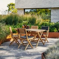 Chaise de jardin avec accoudoirs pliable en teck Flip - Cane-Line