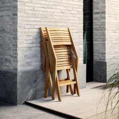 Chaise de jardin avec accoudoirs pliable en teck Flip - Cane-Line