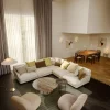 Fauteuil lounge en tissu karakorum dedar blanc et métal noir Pacha - Gubi