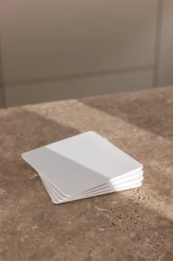 4 sous verres carrés en acier blanc 10x2cm Kiva - Metallbude
