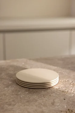 4 sous verres ronds en acier beige cashew 10x2cm Kiva - Metallbude