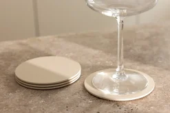 4 sous verres ronds en acier beige cashew 10x2cm Kiva - Metallbude