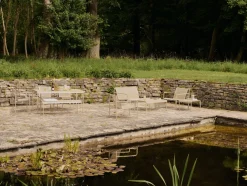 Table basse de jardin beige en acier électro-galvanisé 114x38cm Dapple - Ferm Living
