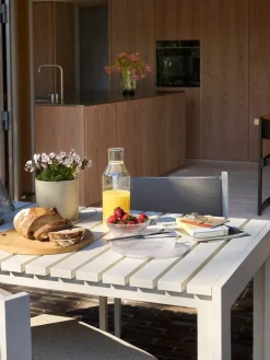 Table à manger de jardin rectangulaire en acier beige 191x80x76cm Haus - Hübsch