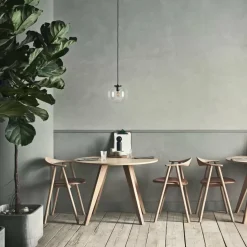 Table ronde en stratifié fenix noir et noyer massif huilé 100 cm New Mood - Bolia